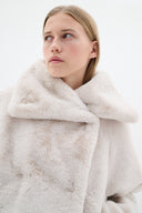 Yoneko Manteau court